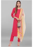 Woman wearing a coral kurti set with dupatta by Nishtha Chadda