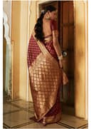 Woman wearing a maroon indian kurti for women by Nishtha Chadda