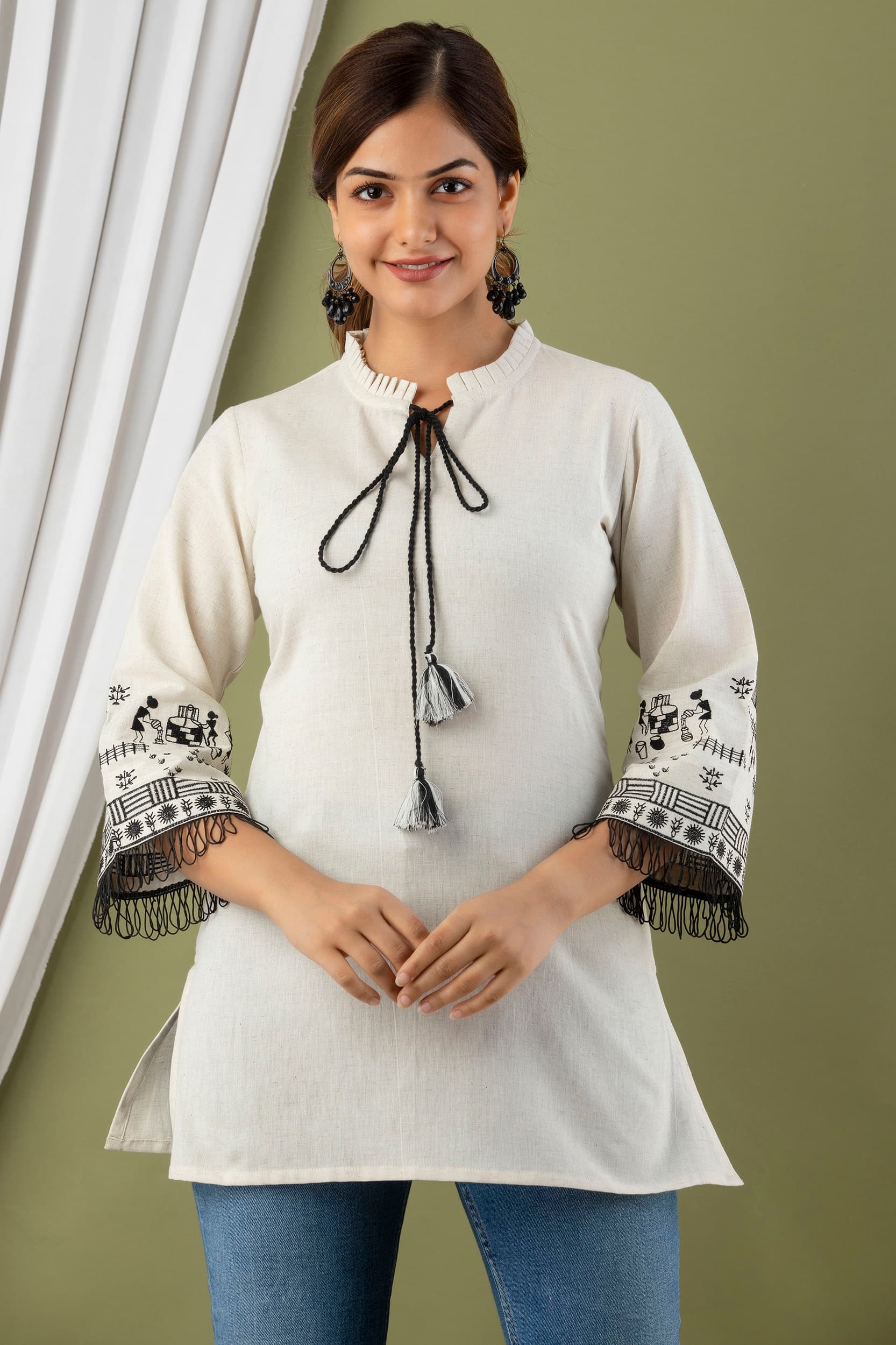 Woman wearing a grey tunic top for women by Nishtha Chadda