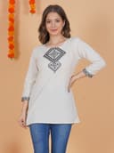 Woman wearing a grey tunic top for women by Nishtha Chadda