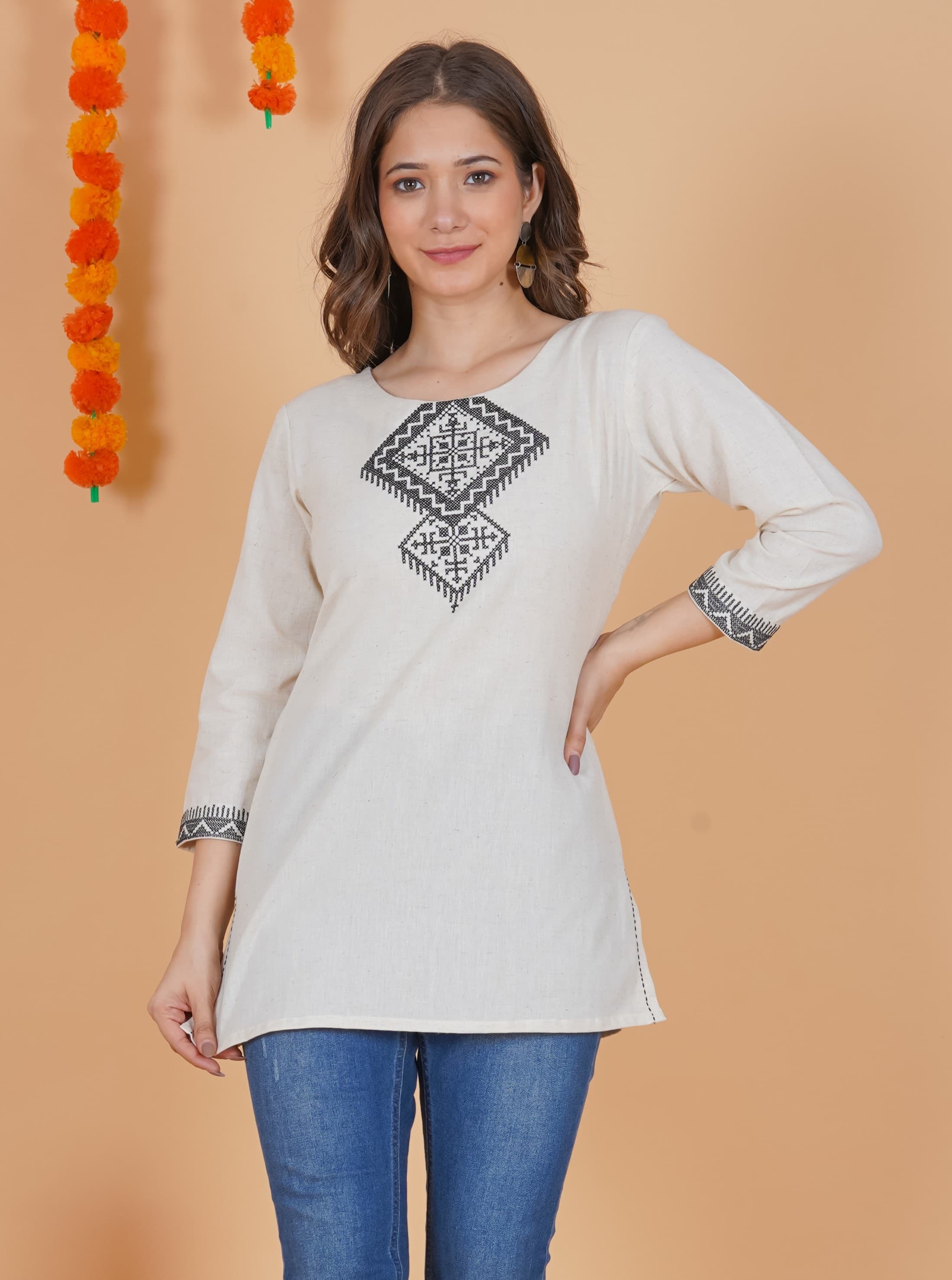 Woman wearing a grey tunic top for women by Nishtha Chadda