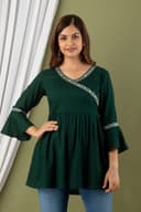 Woman wearing a olive tunic top for women by Nishtha Chadda