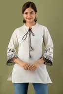 Woman wearing a orange tunic top for women by Nishtha Chadda
