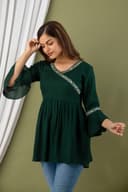 Woman wearing a olive tunic top for women by Nishtha Chadda