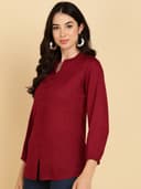 Woman wearing a navy tunic top for women by Nishtha Chadda