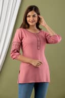Woman wearing a brown tunic top for women by Nishtha Chadda