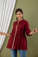 Woman wearing a brown tunic top for women by Nishtha Chadda