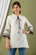 Woman wearing a grey tunic top for women by Nishtha Chadda