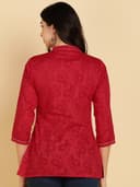 Woman wearing a brown tunic top for women by Nishtha Chadda