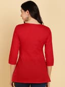 Woman wearing a olive tunic top for women by Nishtha Chadda