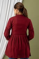 Woman wearing a brown tunic top for women by Nishtha Chadda