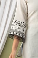Woman wearing a grey tunic top for women by Nishtha Chadda