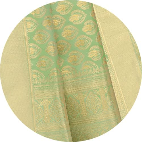 Woman wearing a beige indian kurti for women by Nishtha Chadda