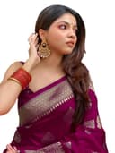 Woman wearing a maroon indian kurti for women by Nishtha Chadda