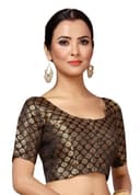 Woman wearing a brown party wear ethnic kurta style by Nishtha Chadda