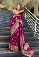 Woman wearing a maroon party wear ethnic kurta style by Nishtha Chadda