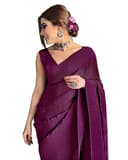Woman wearing a maroon party wear ethnic kurta style by Nishtha Chadda