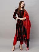 Woman wearing a maroon party wear ethnic kurta style by Nishtha Chadda