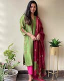 Woman wearing a maroon party wear ethnic kurta style by Nishtha Chadda