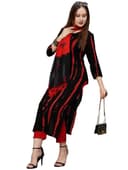 Woman wearing a maroon party wear ethnic kurta style by Nishtha Chadda