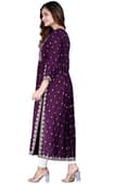 Woman wearing a maroon party wear ethnic kurta style by Nishtha Chadda