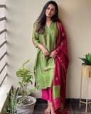 Woman wearing a maroon party wear ethnic kurta style by Nishtha Chadda