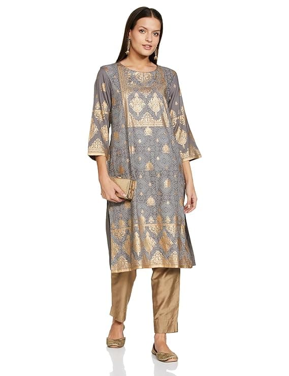 Woman wearing a grey party wear ethnic kurta style by Nishtha Chadda