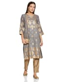 Woman wearing a grey party wear ethnic kurta style by Nishtha Chadda