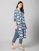 Woman wearing a grey party wear ethnic kurta style by Nishtha Chadda