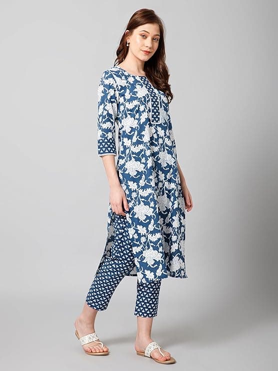 Woman wearing a grey party wear ethnic kurta style by Nishtha Chadda