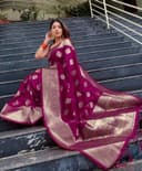 Woman wearing a maroon party wear ethnic kurta style by Nishtha Chadda
