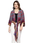 Woman wearing a brown party wear ethnic kurta style by Nishtha Chadda