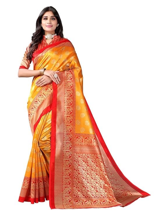 Woman wearing a orange party wear ethnic kurta style by Nishtha Chadda