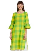 Woman wearing a mustard party wear ethnic kurta style by Nishtha Chadda