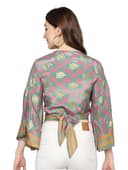 Woman wearing a grey party wear ethnic kurta style by Nishtha Chadda
