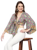 Woman wearing a brown party wear ethnic kurta style by Nishtha Chadda