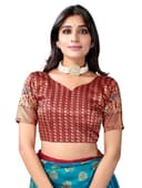 Woman wearing a brown party wear ethnic kurta style by Nishtha Chadda