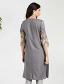 Woman wearing a grey party wear ethnic kurta style by Nishtha Chadda