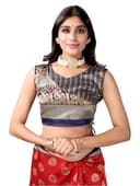 Woman wearing a red party wear ethnic kurta style by Nishtha Chadda