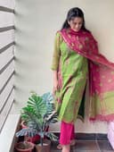 Woman wearing a brown party wear ethnic kurta style by Nishtha Chadda