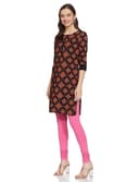 Woman wearing a brown party wear ethnic kurta style by Nishtha Chadda