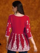 Woman wearing a brown party wear ethnic kurta style by Nishtha Chadda