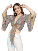 Woman wearing a grey party wear ethnic kurta style by Nishtha Chadda