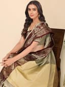 Woman wearing a maroon party wear ethnic kurta style by Nishtha Chadda