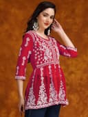 Woman wearing a brown party wear ethnic kurta style by Nishtha Chadda