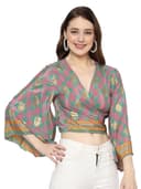 Woman wearing a grey party wear ethnic kurta style by Nishtha Chadda