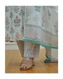 Woman wearing a olive party wear ethnic kurta style by Nishtha Chadda