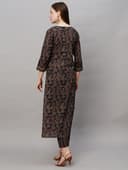 Woman wearing a brown party wear ethnic kurta style by Nishtha Chadda