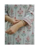 Woman wearing a grey party wear ethnic kurta style by Nishtha Chadda