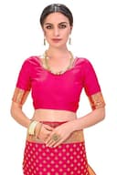 Woman wearing a red party wear ethnic kurta style by Nishtha Chadda